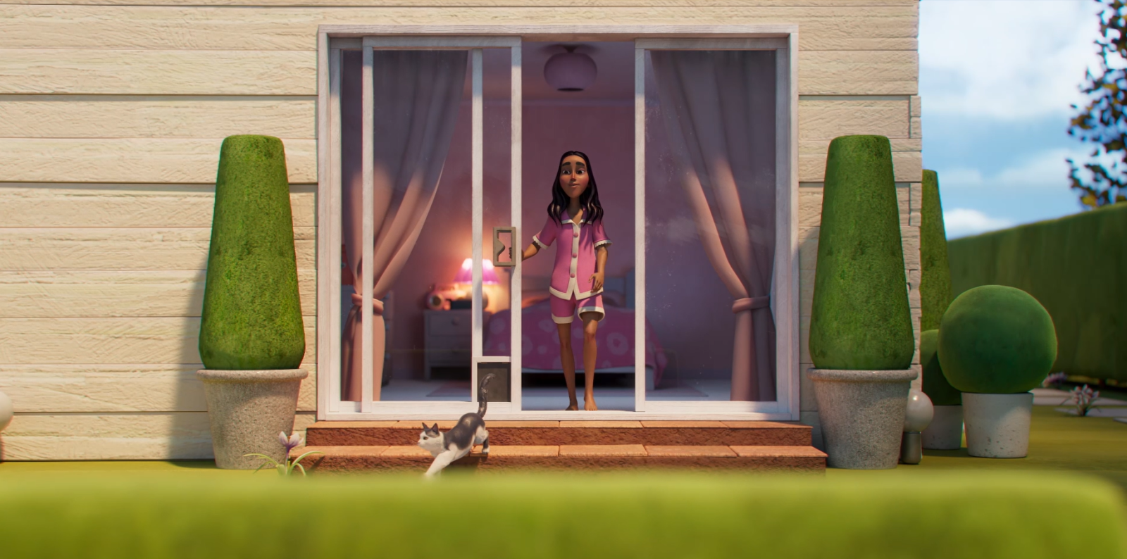 A woman in pink sleepwear stands at a sliding glass door, looking outside. A gray and white cat walks past on the patio, while neatly trimmed shrubs frame the scene. Inside, soft pink light illuminates a cozy room.