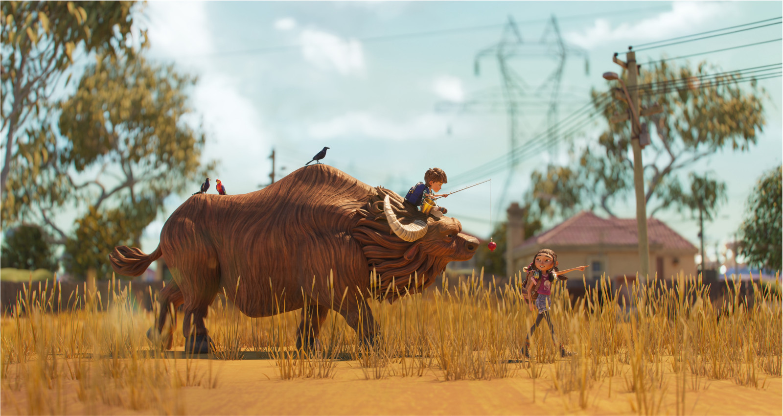 Two children interact playfully with a large, stylized buffalo in a dry, grassy landscape. One child sits on the buffalo while the other walks beside it, pointing excitedly, with two birds perched on the animal's back. In the background, power lines and trees are visible, along with a residential building.