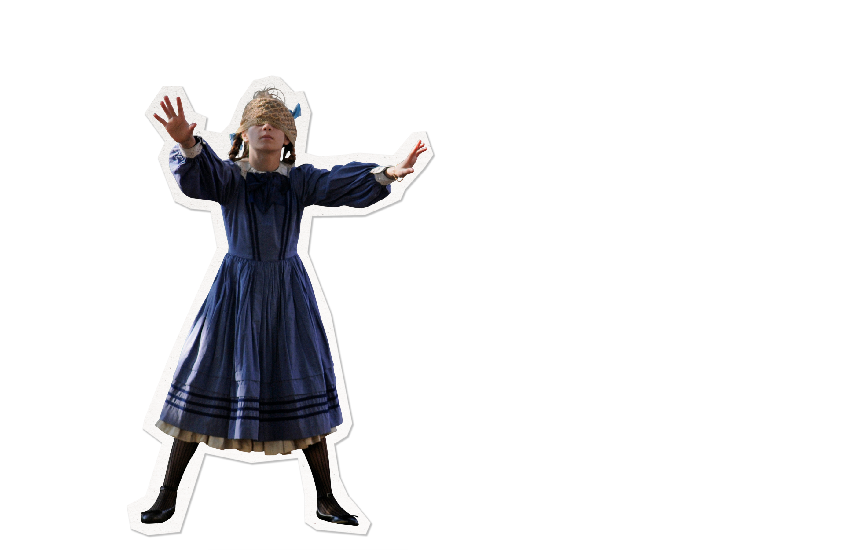 A child in a dark blue dress, with long sleeves and a gathered waist, stands in an expressive pose with arms raised. She wears a woven headpiece that covers her eyes, creating a playful and whimsical atmosphere. The background is black, highlighting her figure.