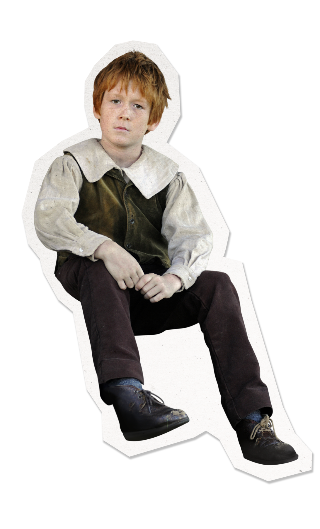A young boy with tousled red hair sits on the ground, wearing a white collared shirt and a dark vest over brown trousers. He has a serious expression and wears black shoes, with a neutral background that enhances his appearance.